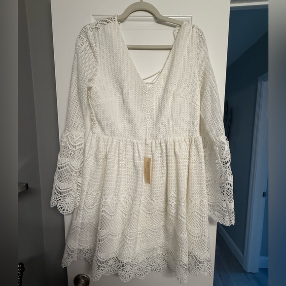 Dion Lee Dresses & Skirts - NWT White Lace Dress with bell sleeves size 6